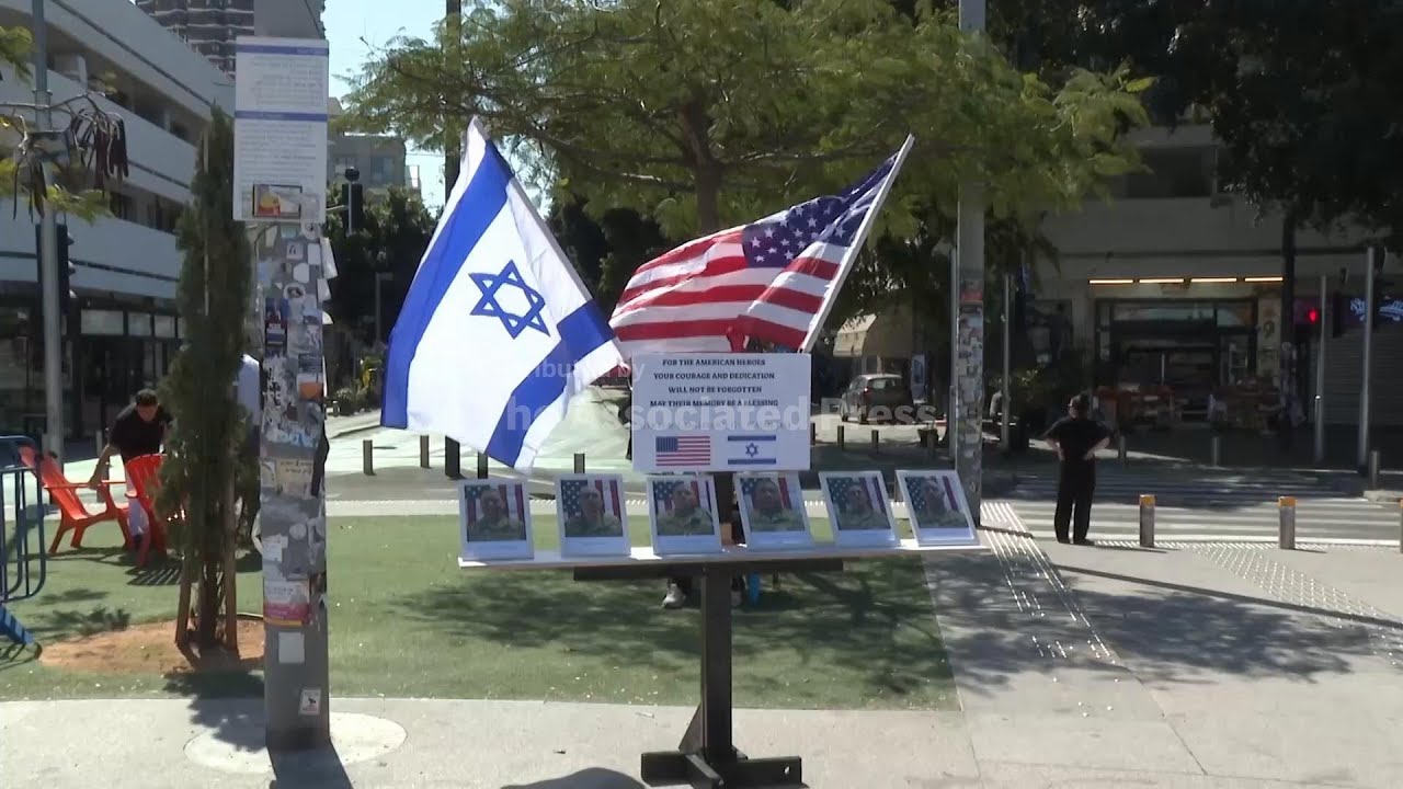 A small memorial is set up in Tel Aviv for six U.S. soldiers killed in a drone strike in Kuwait