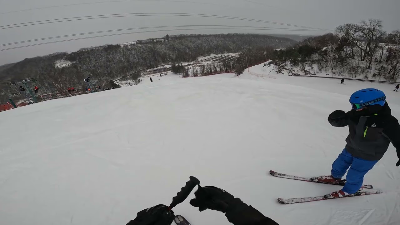 25 12 30 Afton Alps with Joe and kid 8 - hockey stopped girls