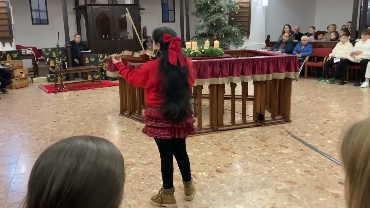 Rebeka gave a violin solo at the Reformed Church on Christmas Eve 