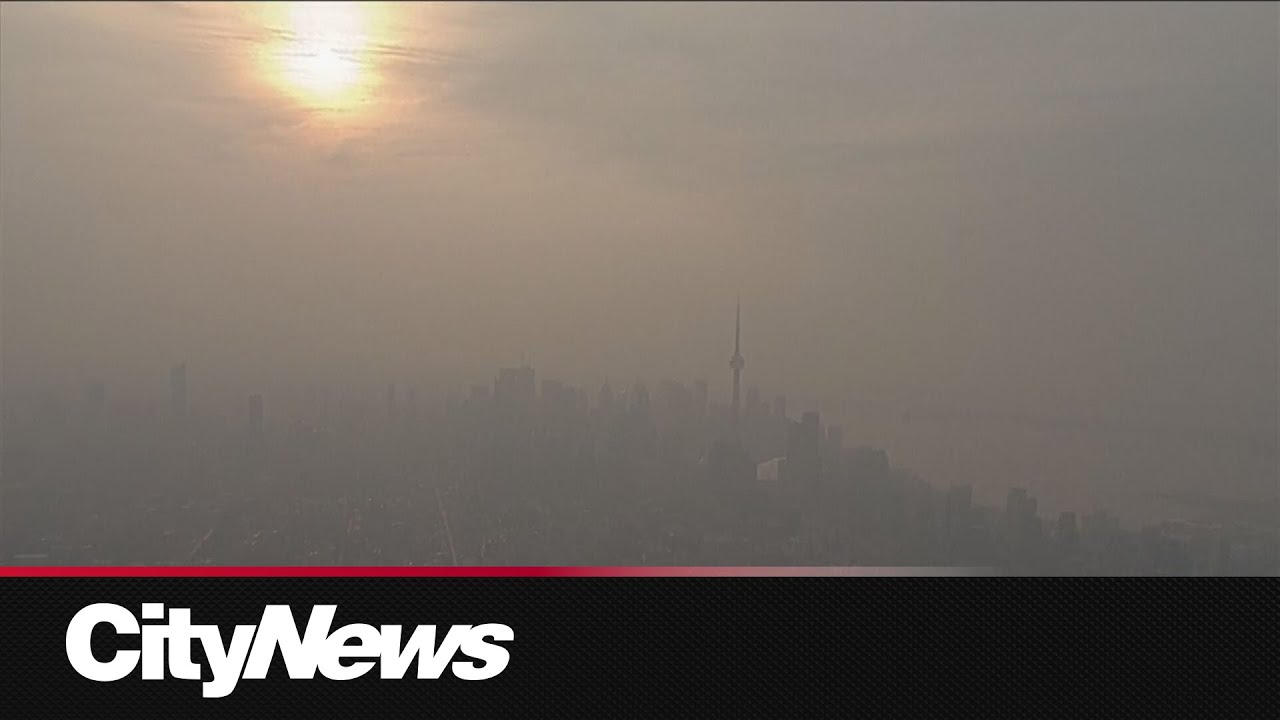 Chopper footage captures Toronto skyline smothered in wildfire smoke