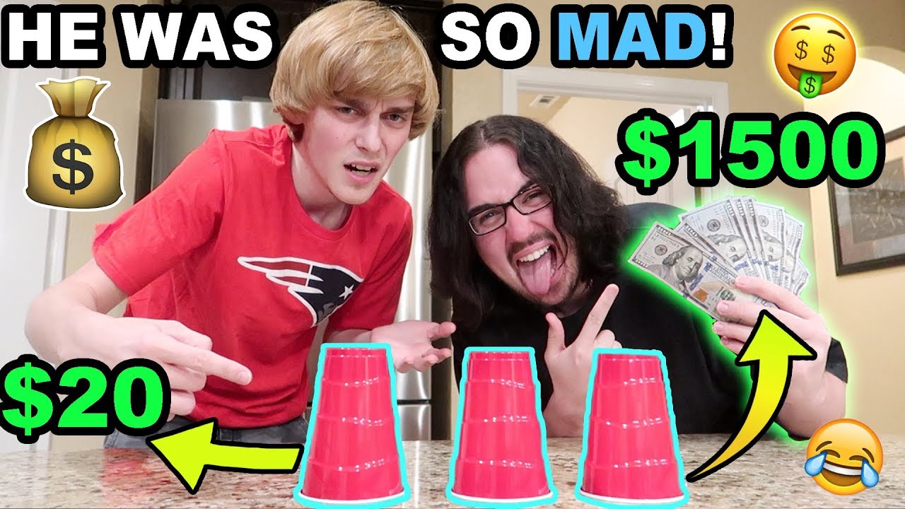 LOGAN LOST $1500 DOLLARS!! (THE CUP TRICK) (BACKFIRE)