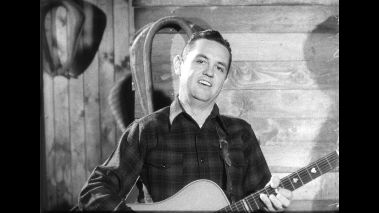 Master guitarist Merle Travis slick picking live and brief interview 1955