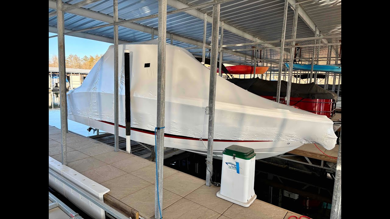 guy shrink wraps (another) boat