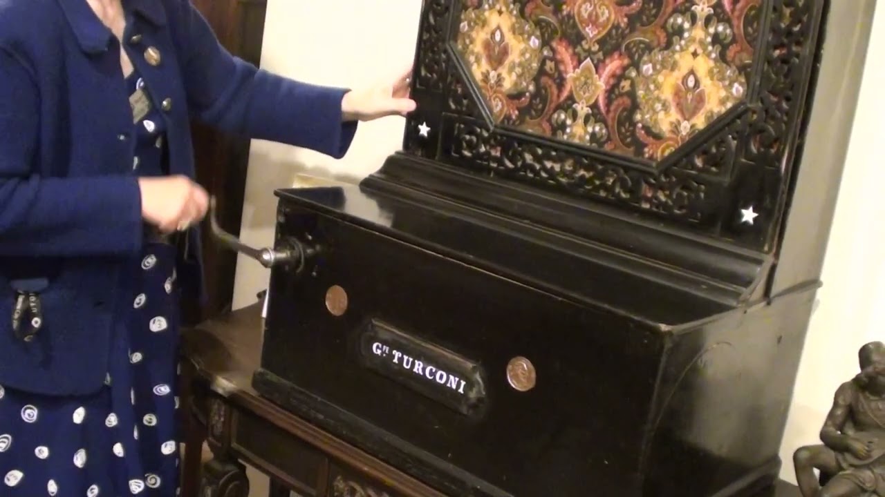 Small Crank Piano Demonstrated At Music House Museum