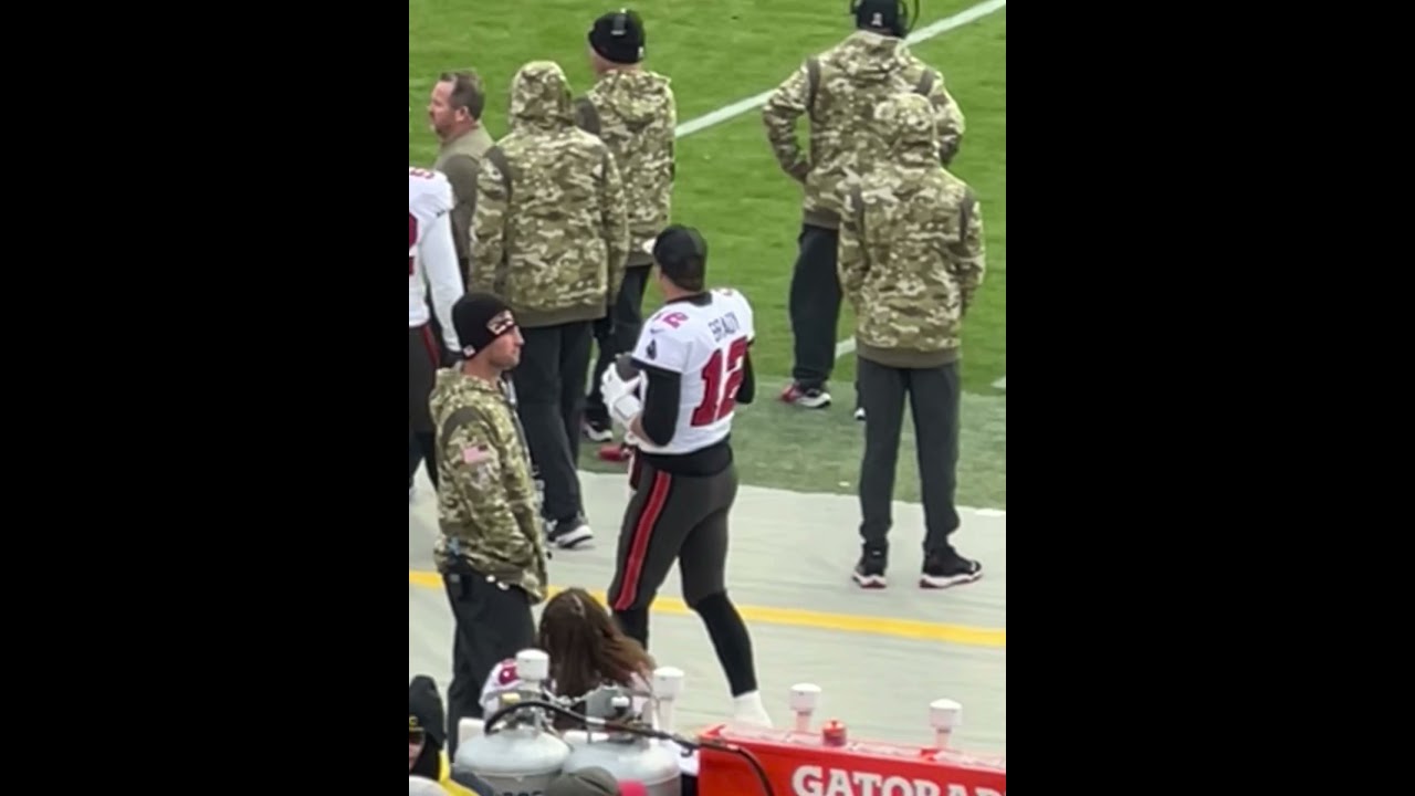 TB12 throwing bullet pass on sideline