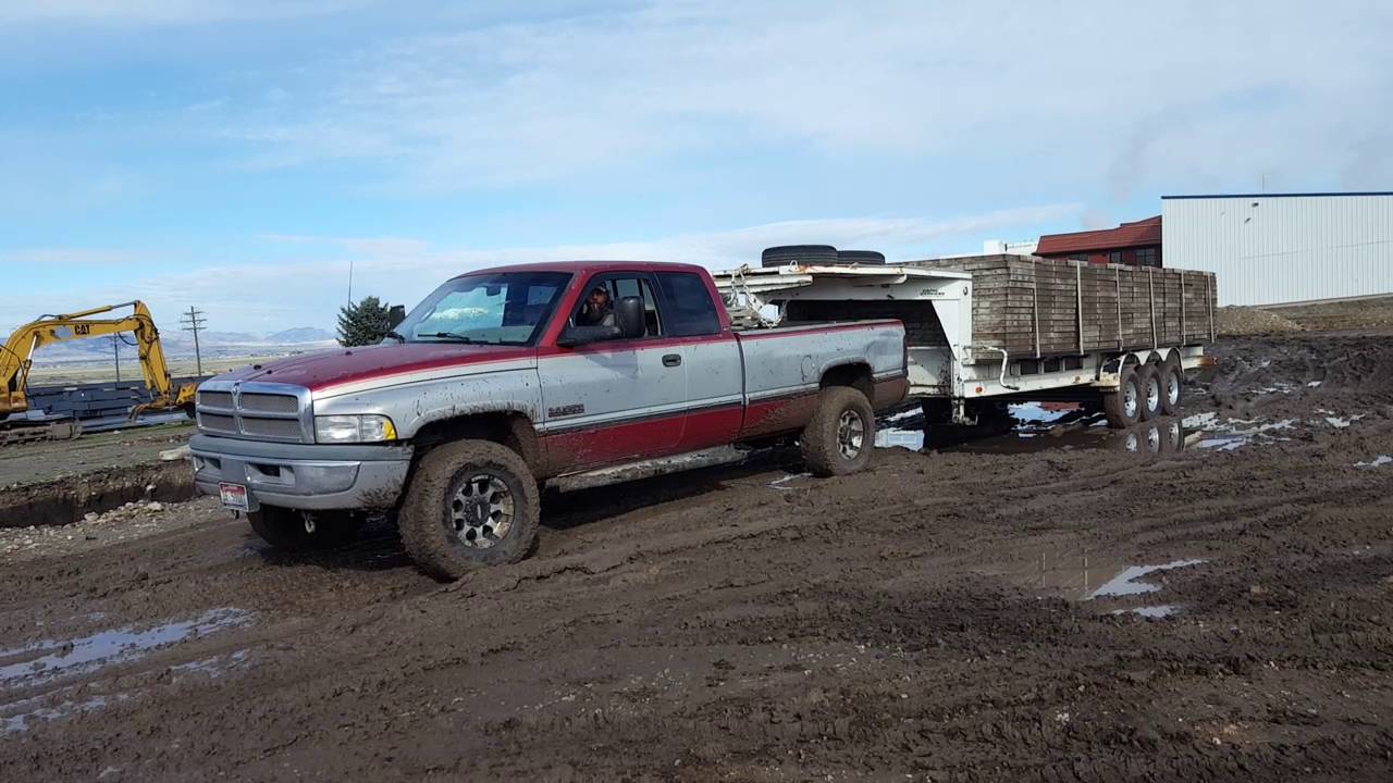12-Valve Cummins playin in the mud with 30,000lbs Concrete trailer