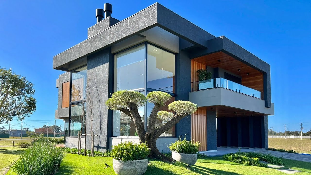 SOBRADO LUXUOSO DE ESQUINA COM ÁREA VERDE, FINAMENTE DECORADO COM 318M² EM CONDOMÍNIO FECHADO!