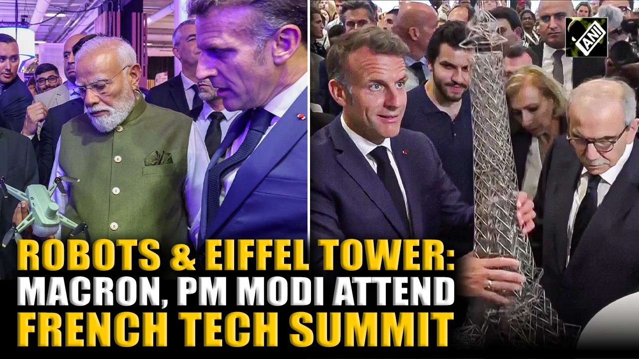 Macron and Modi visit Paris tech conference featuring robots and Eiffel Tower model