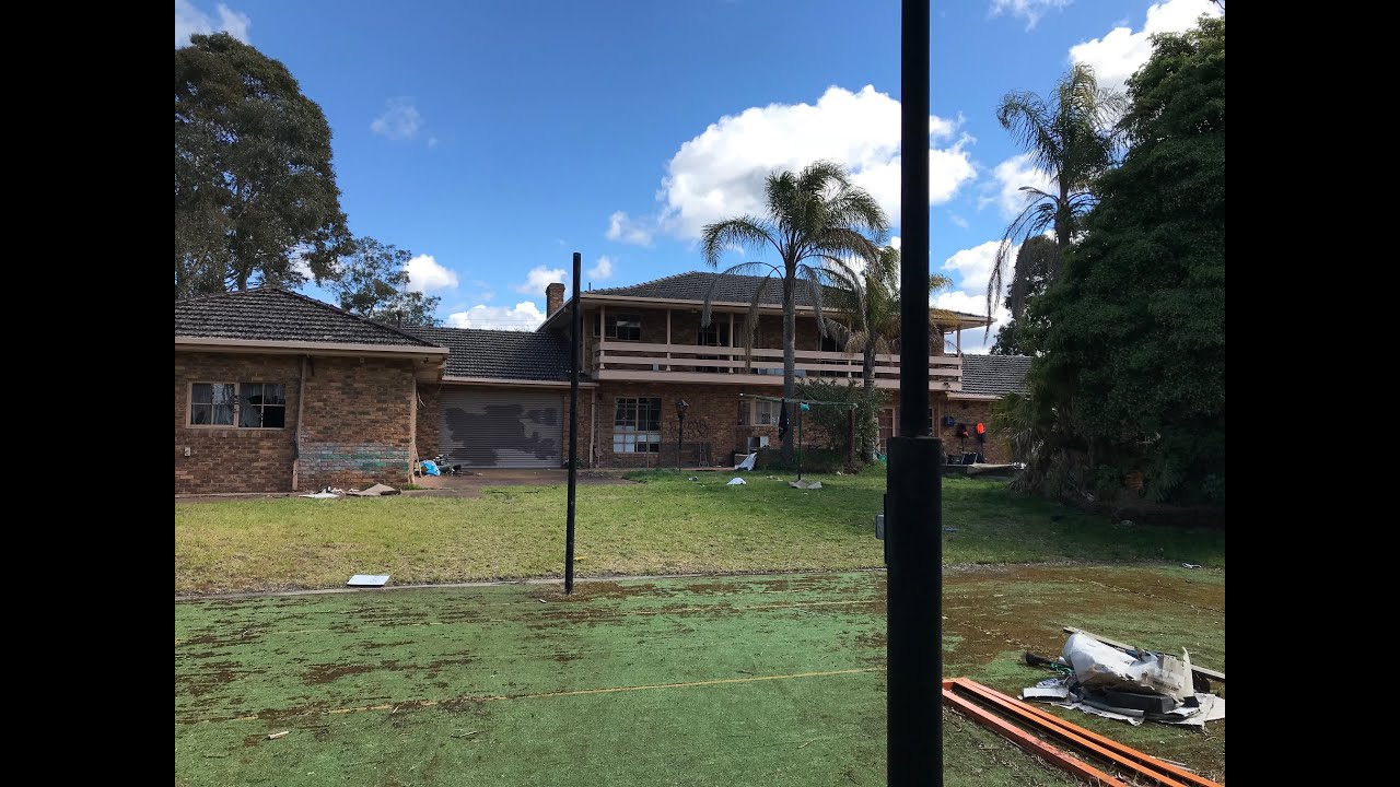 Abandoned Mansion. Found squatters room. Pool and tennis court.