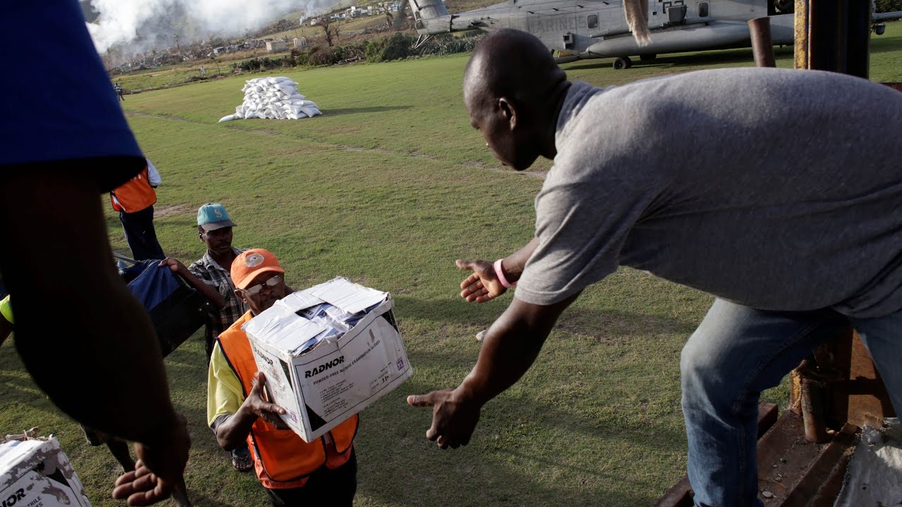 Haitians wait for aid after storm
