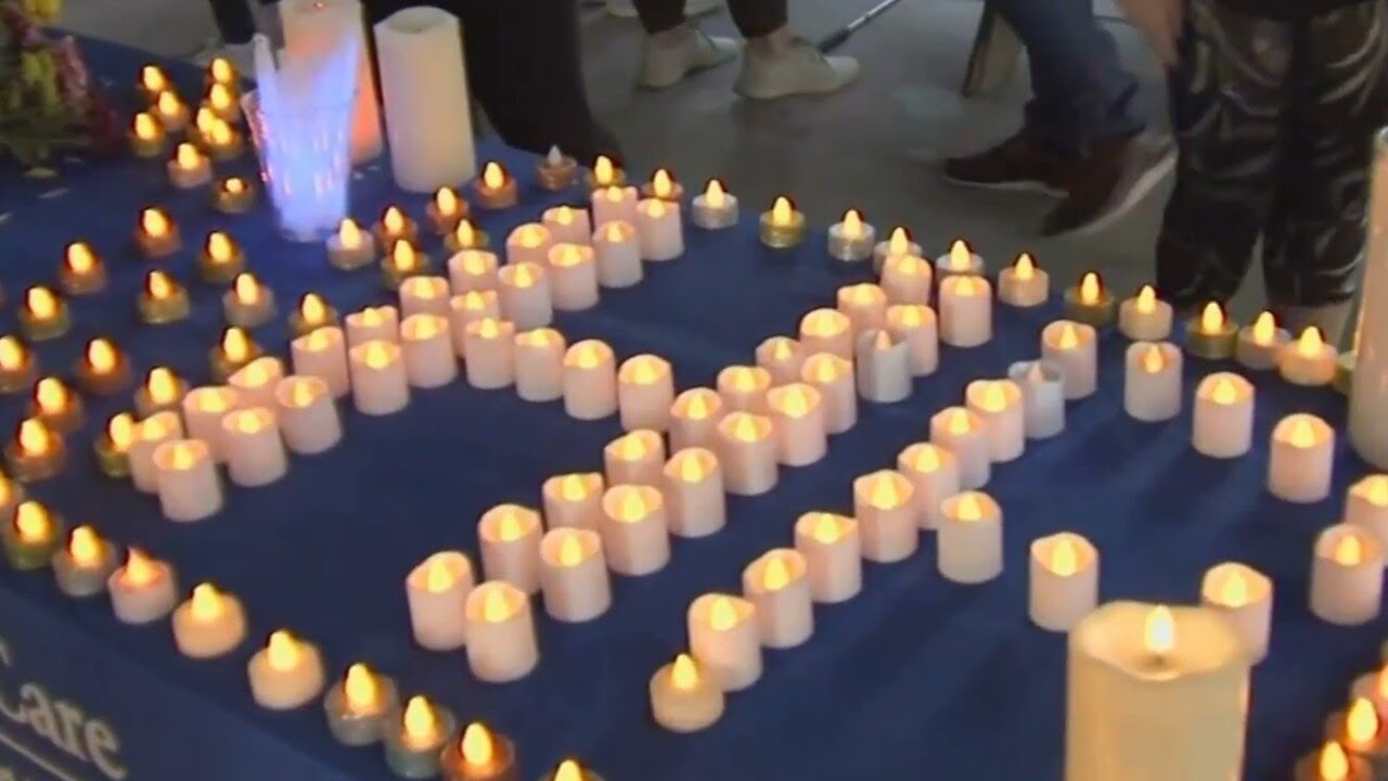 Highland Park shooting victims honoured at candlelight vigil
