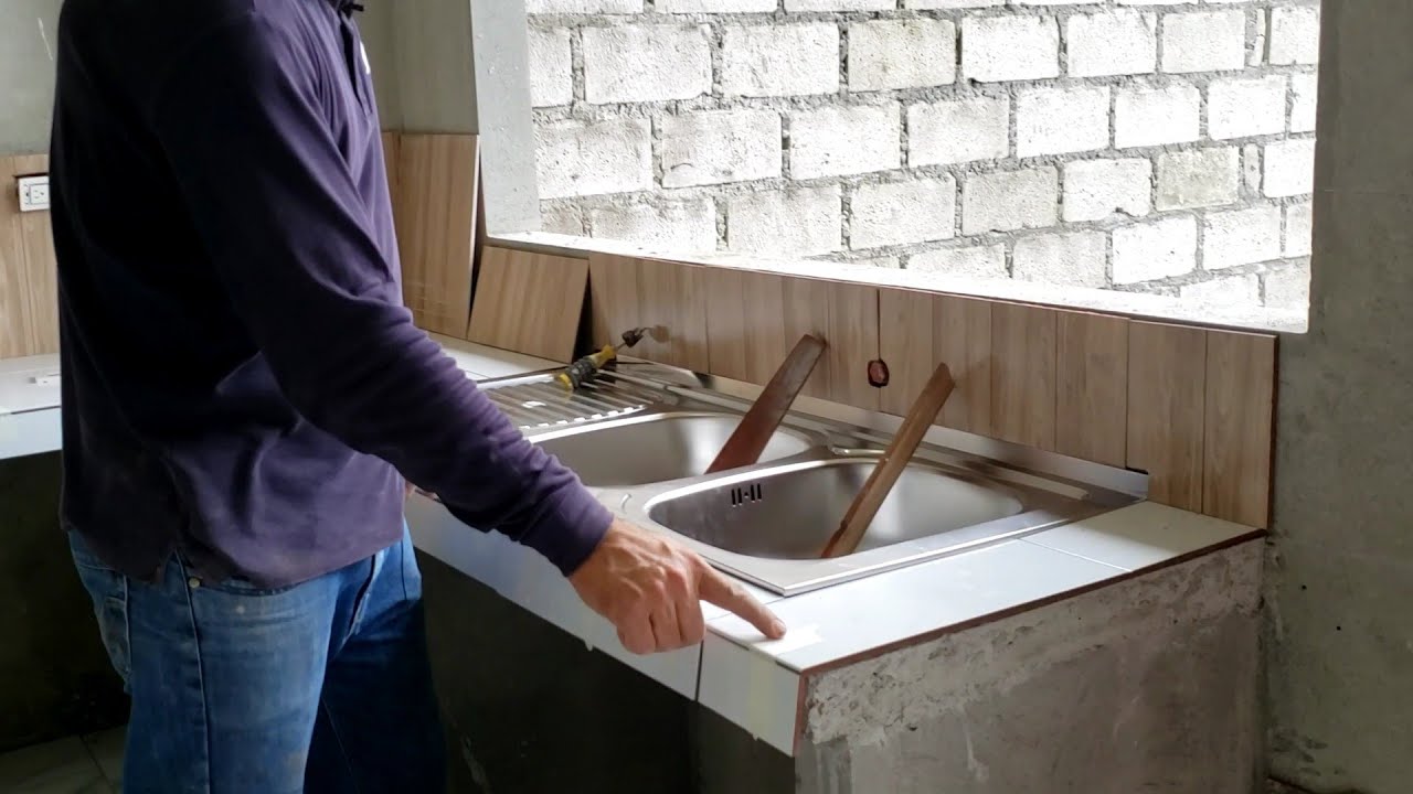 colocaccion de  CERAMICA  en mesón de cocina tipo  escuadra