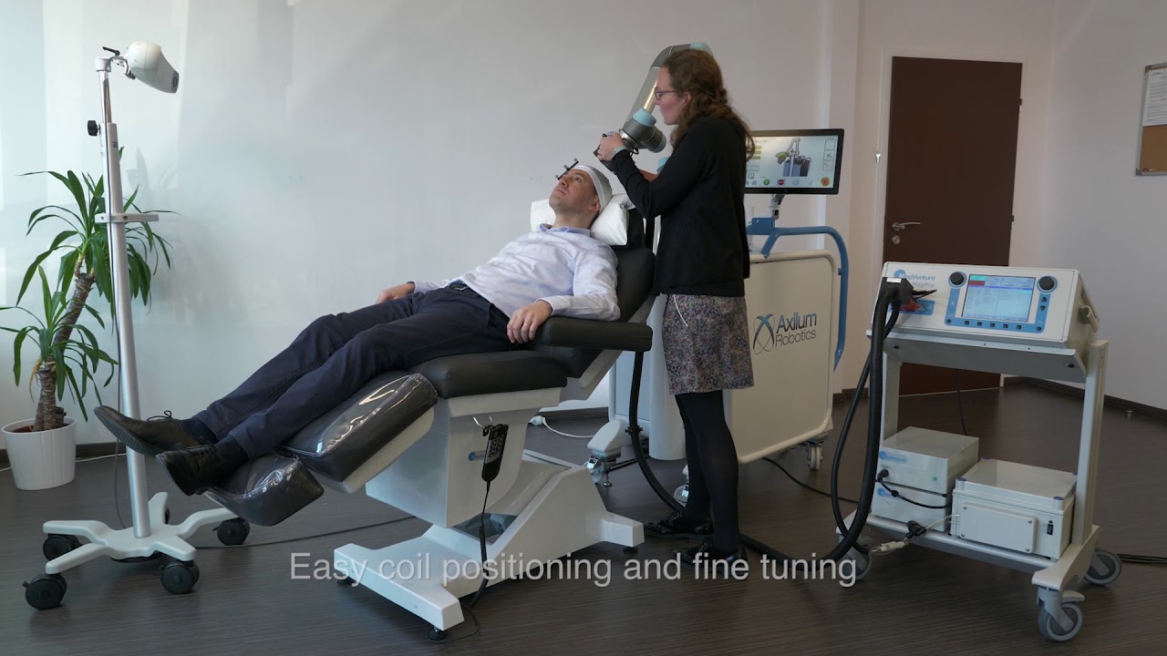 Robotized TMS with TMS-Cobot and optical tracking system - Axilum Robotics with MagVenture