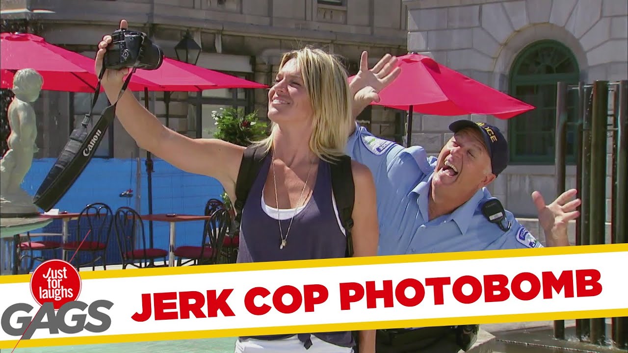 Jerk Cop Photobombs Tourist's Picture