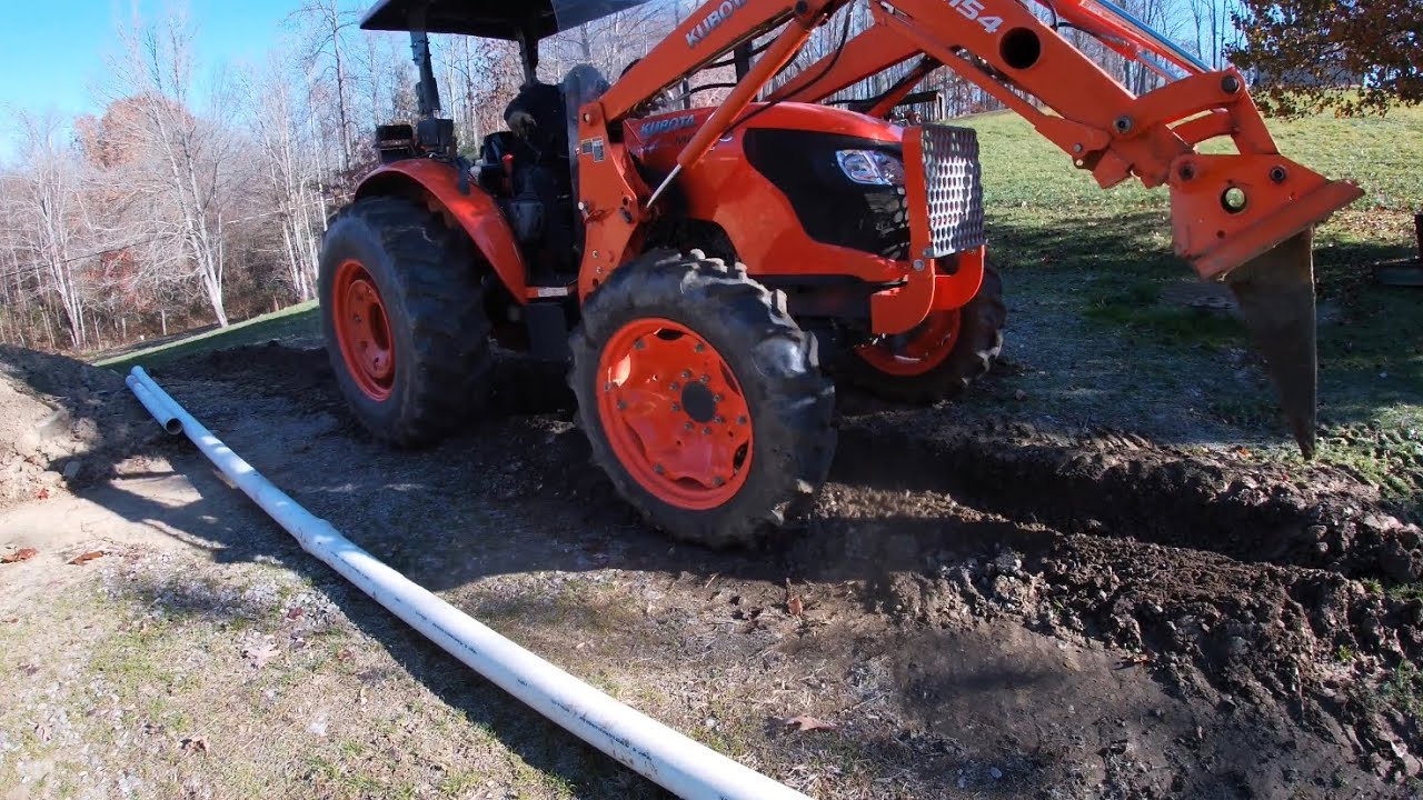 Ditching with a Stump Bucket in Frozen Ground! Building a Parking Pad!
