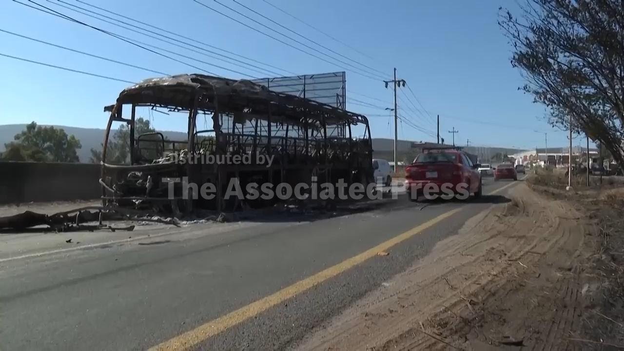 Burnt vehicles block road outside Jalisco capital after Mexican cartel leader’s killing
