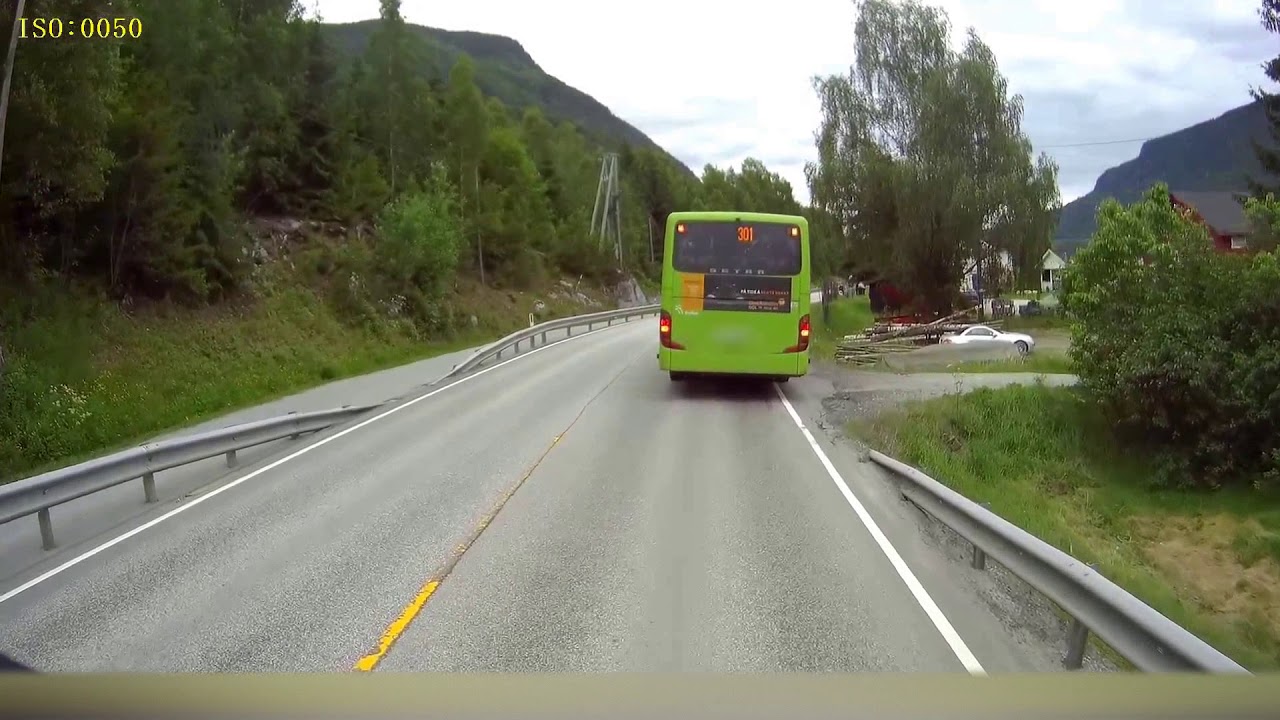 ORIGINAL: Dashcam Norway - Semi truck narrowly missing kids