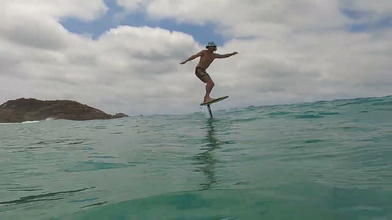 Josh Ku Shorerun prone foil at Lighthouse beach Seal Rocks. Unifoil Progression 140
