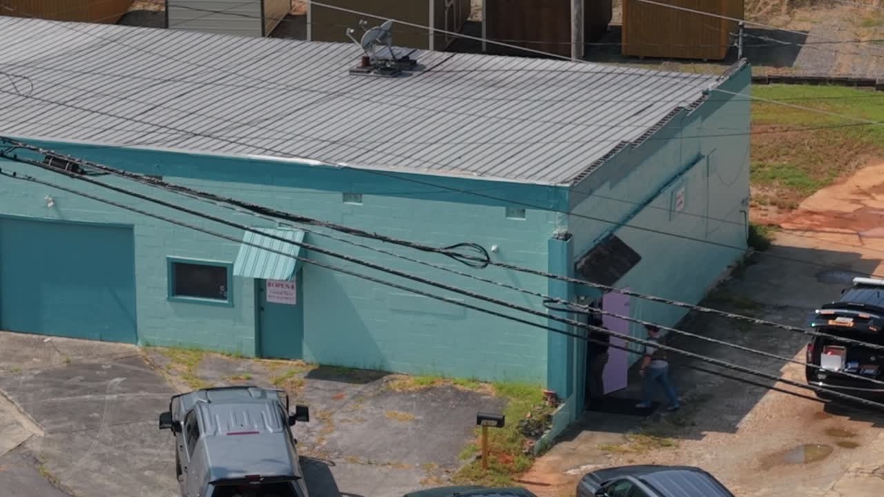 Seven massage parlors served search warrants in investigation into prostitution, sex trafficking