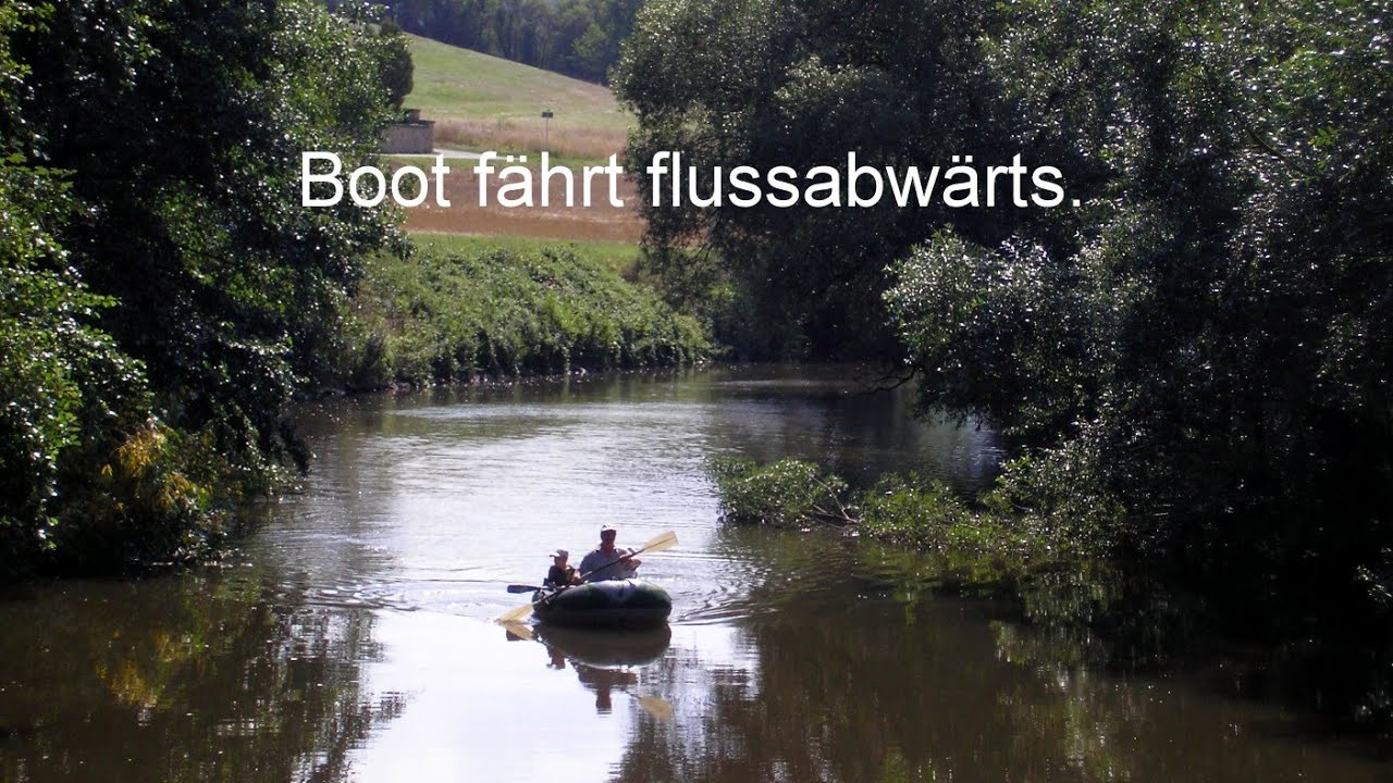 Boot  fährt  flussabwärts.  Glan. 7.08.2006.