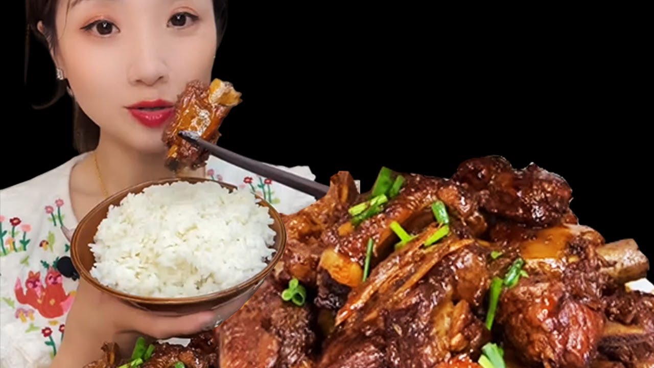 Yummy eating sweet and sour pork ribs really delicious
