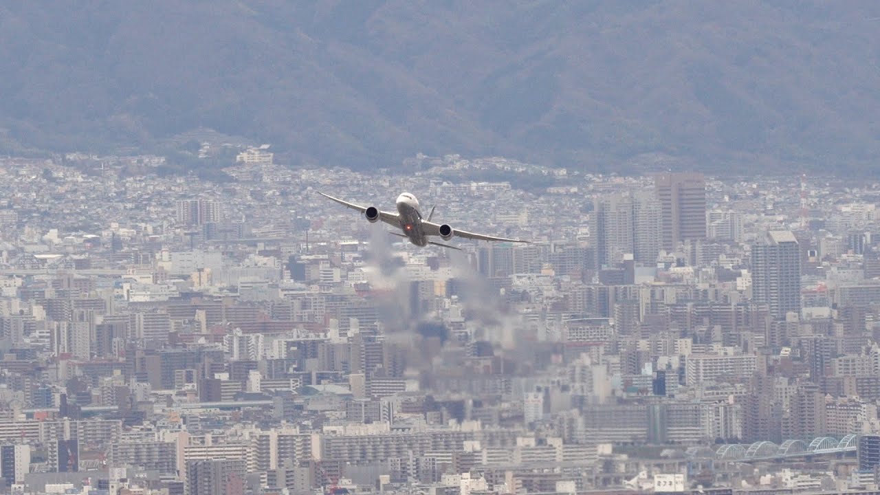 Professional Pilots Taking Off From Osaka with ATC