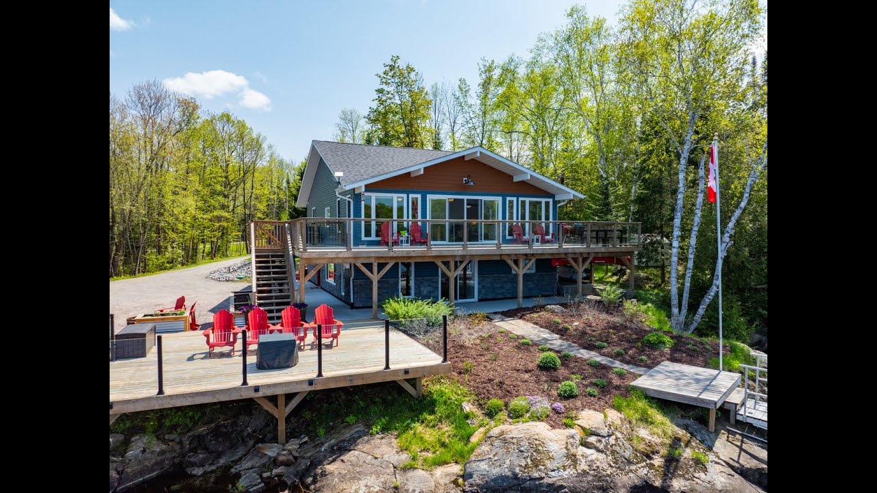 Lake house on Whitestone lake, 340 feet of gentle entry & deep water shoreline with endless sunsets