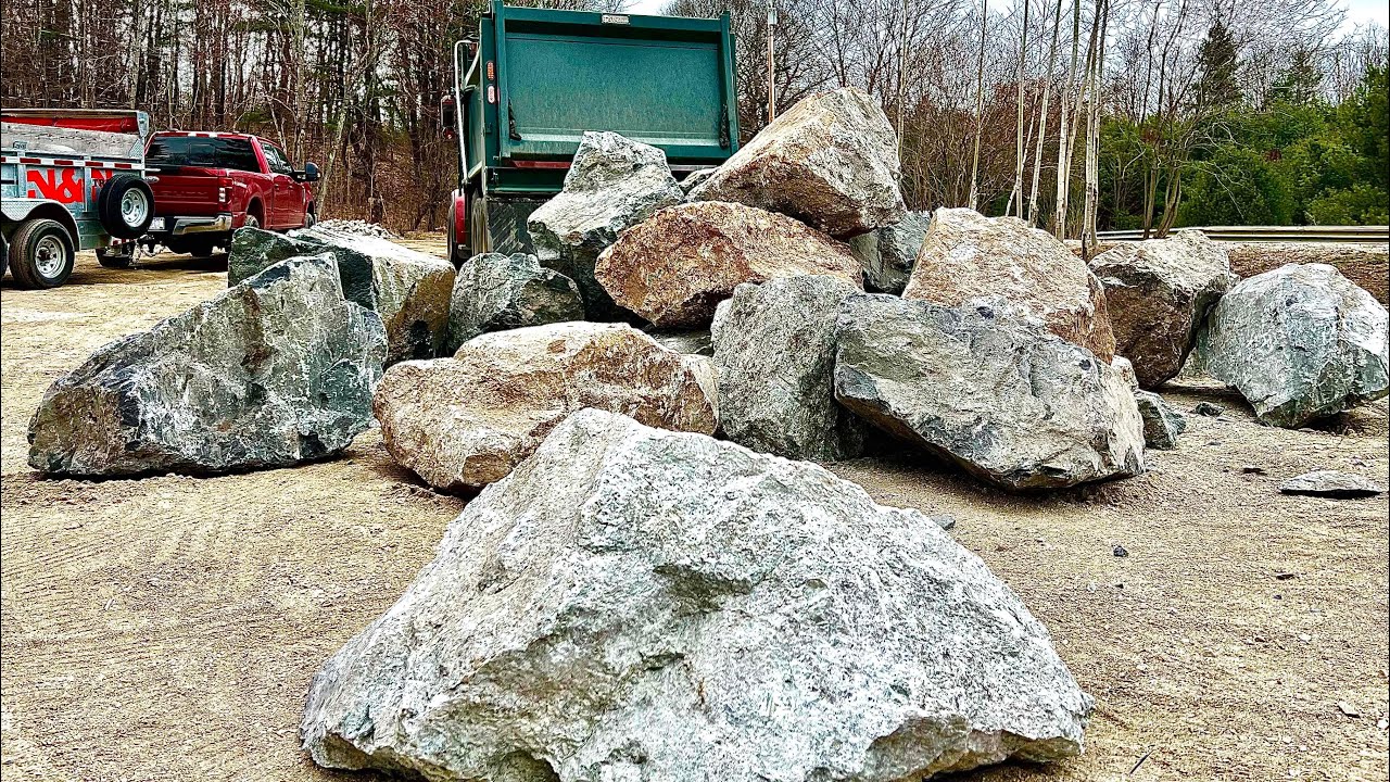 How to move big rocks with mini excavator at the Disc Golf Course