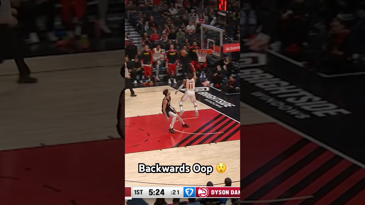Trae Young throws a BACKWARDS Oop 👀