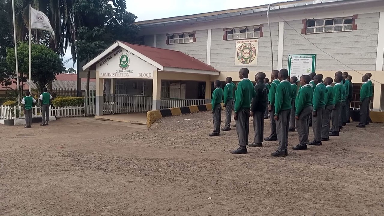 Scouts parade at assembly.