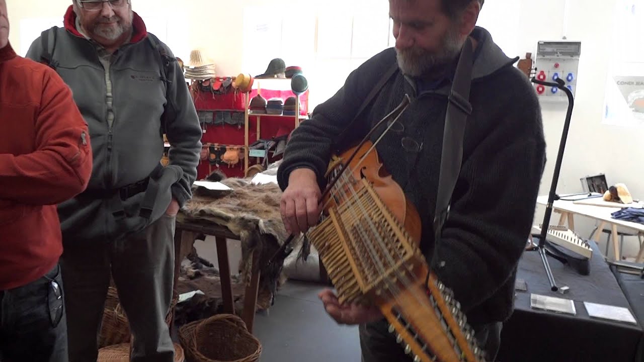 Jean-Claude Condi demonstrates how he plays his Nyckelharpa
