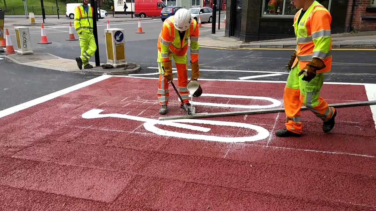 Painting a bicycle on the road