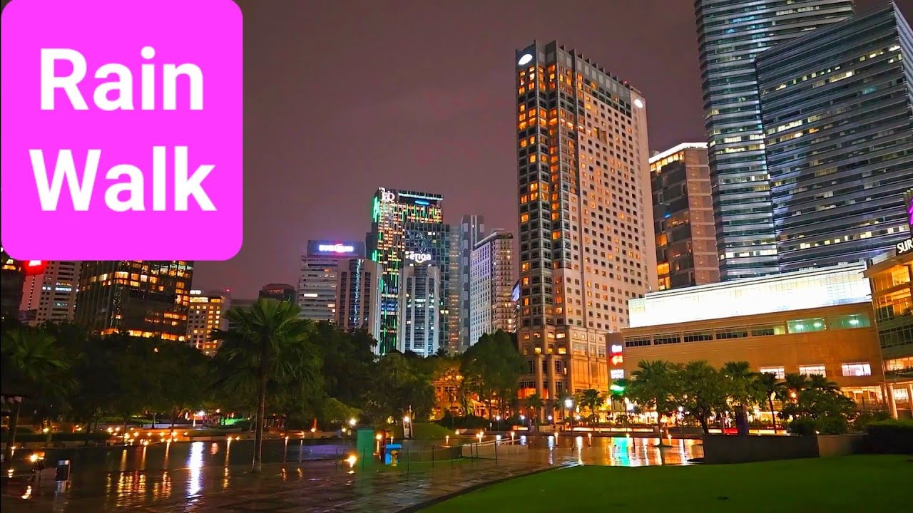 Walking in the Rain (Vid-85) from Jalan Pinang to KLCC Park in Kuala Lumpur, Malaysia.
