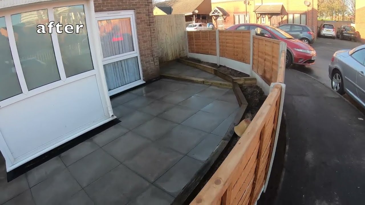 fencing, patio with flower bed. garden transformation