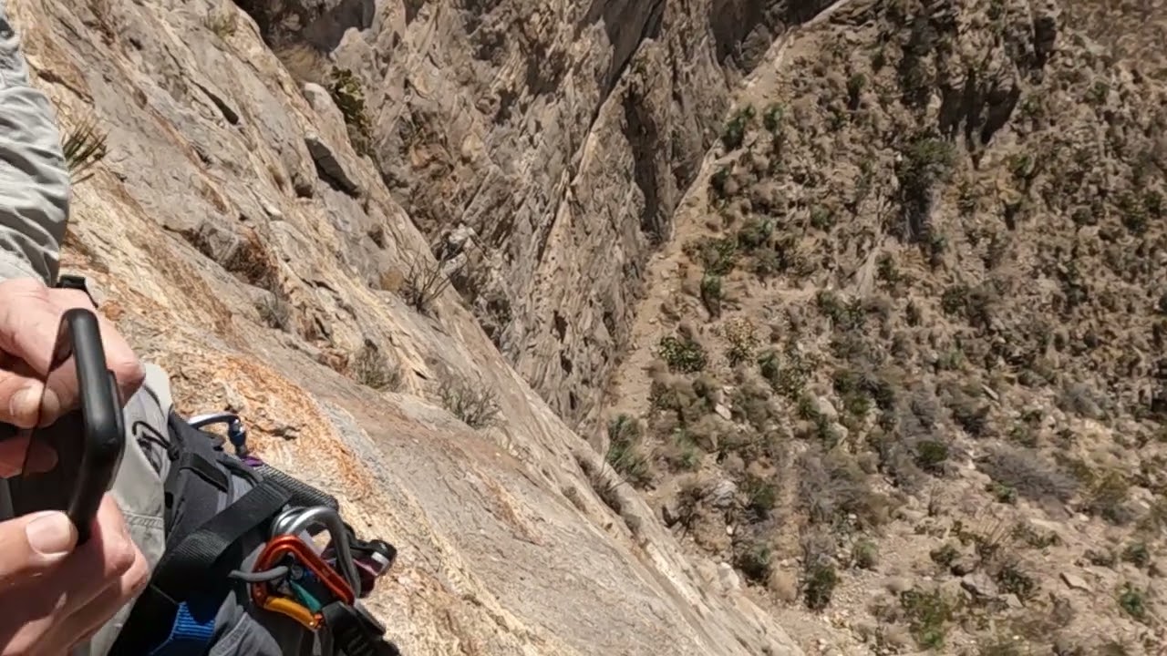 Max rappeling Green Goddess (pitch 3 to pitch 2) from p3 to p2
