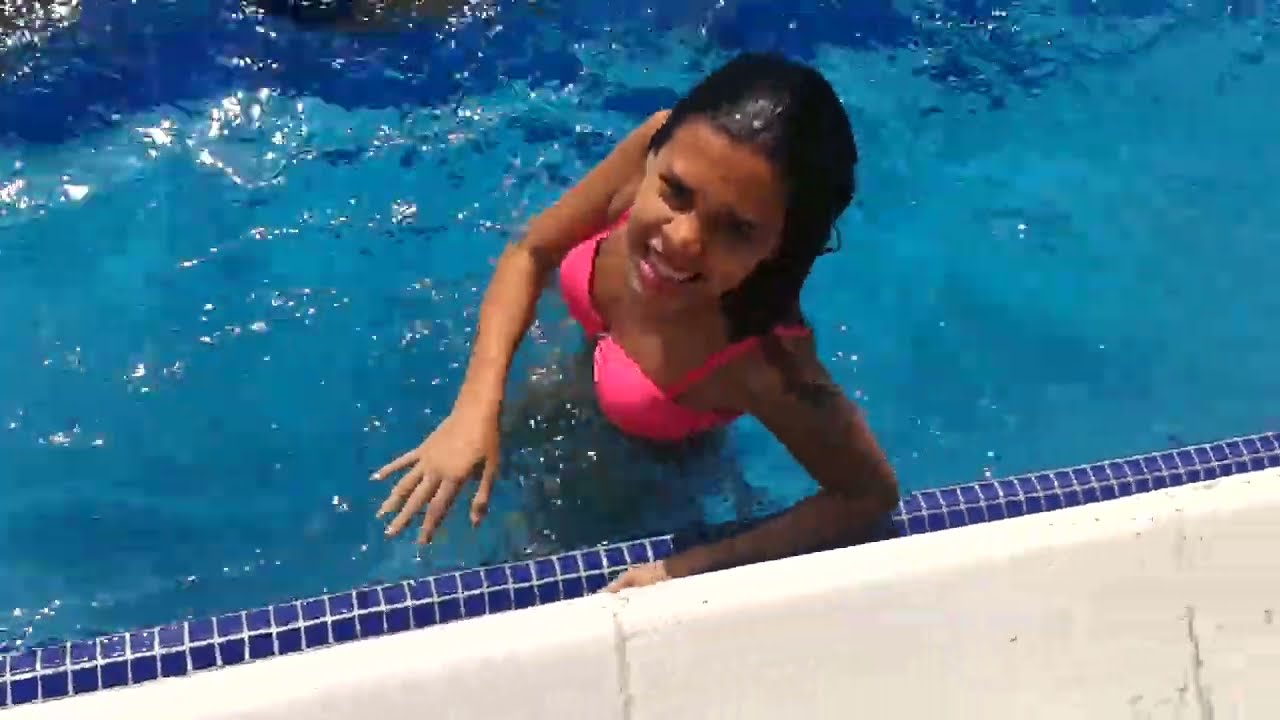 She has lots of fun in the pool