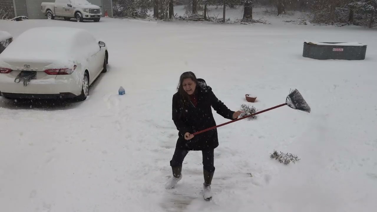 Sweeping the Snow Away 