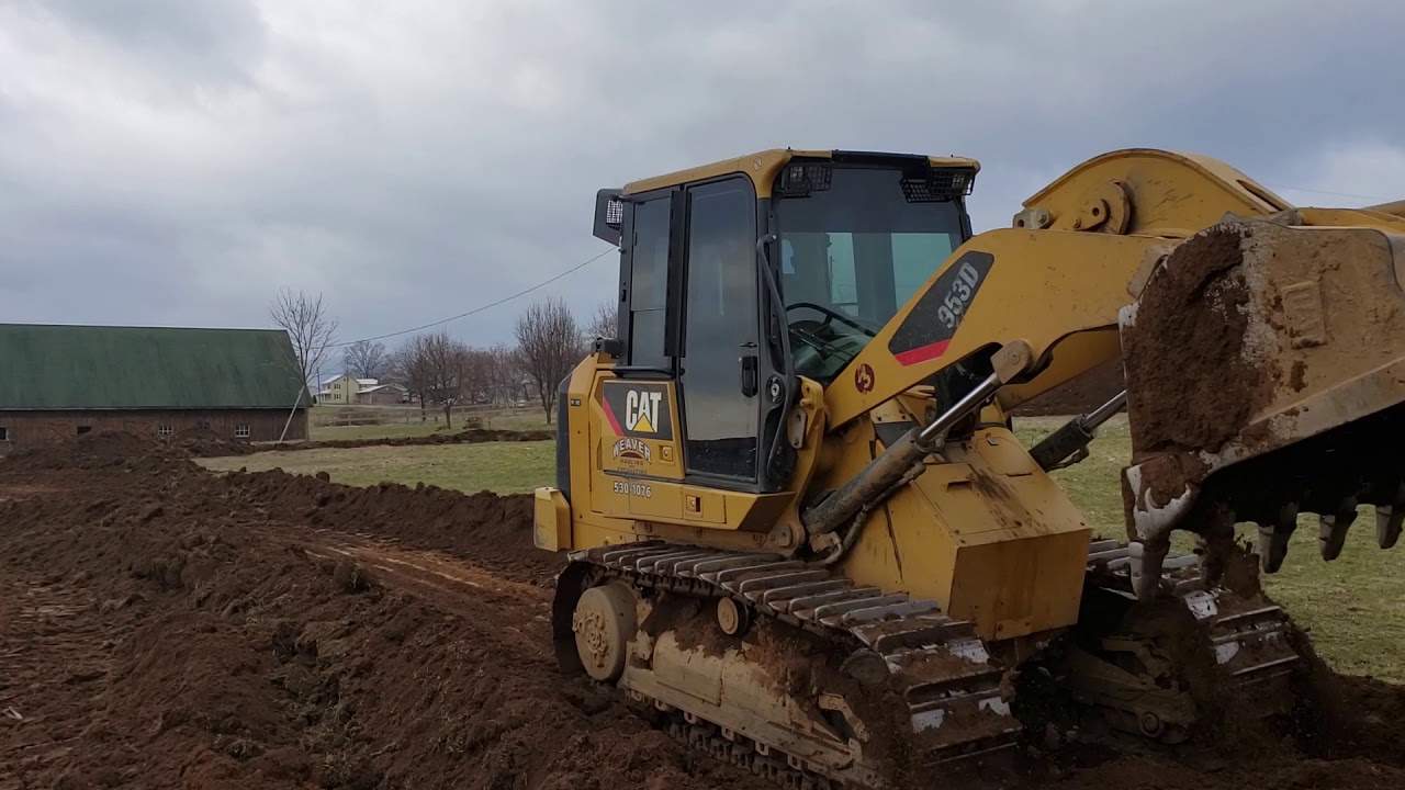 953 d track loader stripping topsoil