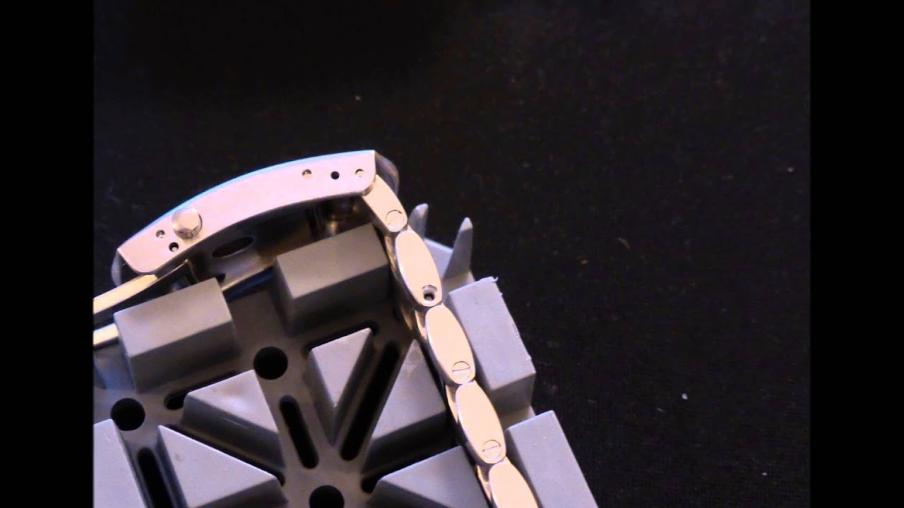 Omega screw type watch bracelet link removal and adjustment