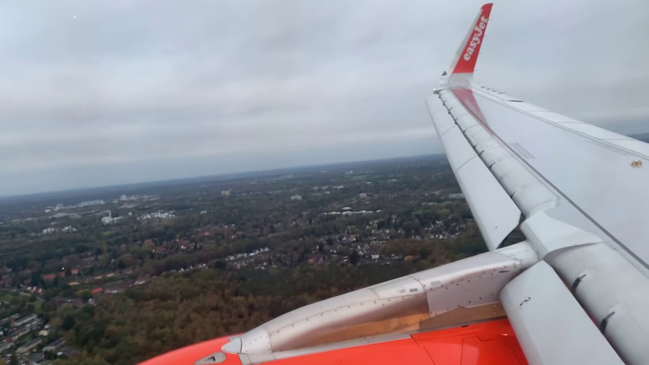 Easyjet Airbus A320 Dangerous landing by storm in Hamburg Airport Runway 23 with Go Around