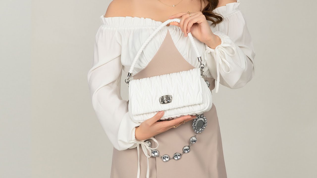 Quilted rhinestone embellished chain shoulder bag