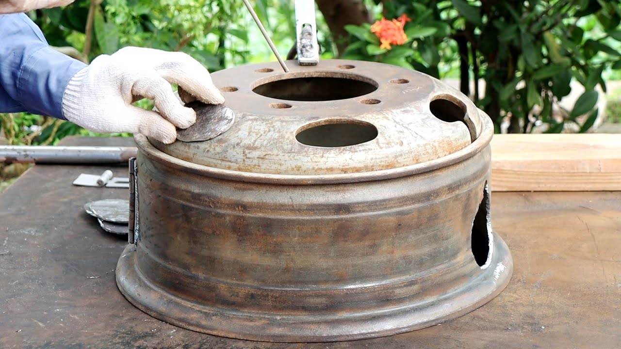 How to make a wood stove + BBQ oven from old car rims and gas cylinders