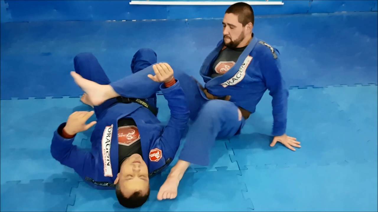 Marcos Schubert Jiu-Jitsu Defesa arm lock finalizando o p&eacute; - www.schubertshop.com