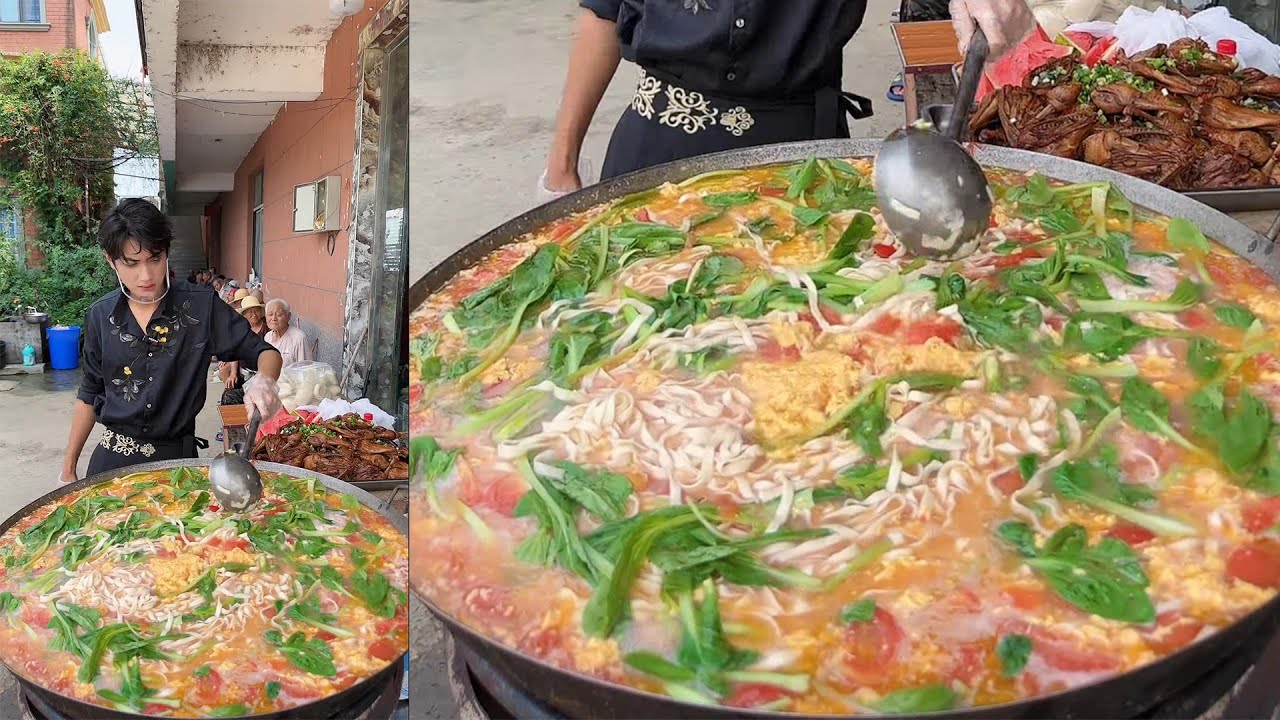 Another Chinese Guy Cook Free Noodles Food for the elders on the Street in a Downtown Village