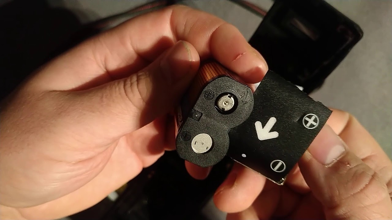 Fuji DL-200 battery replacement and opening rear.