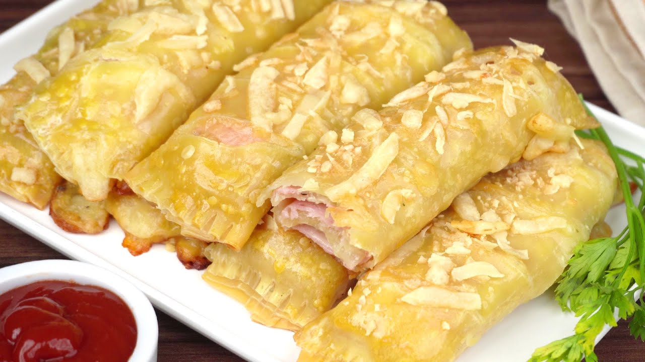 Com a massa de pastel, faça esse enroladinho de presunto e queijo super fácil e delicioso!
