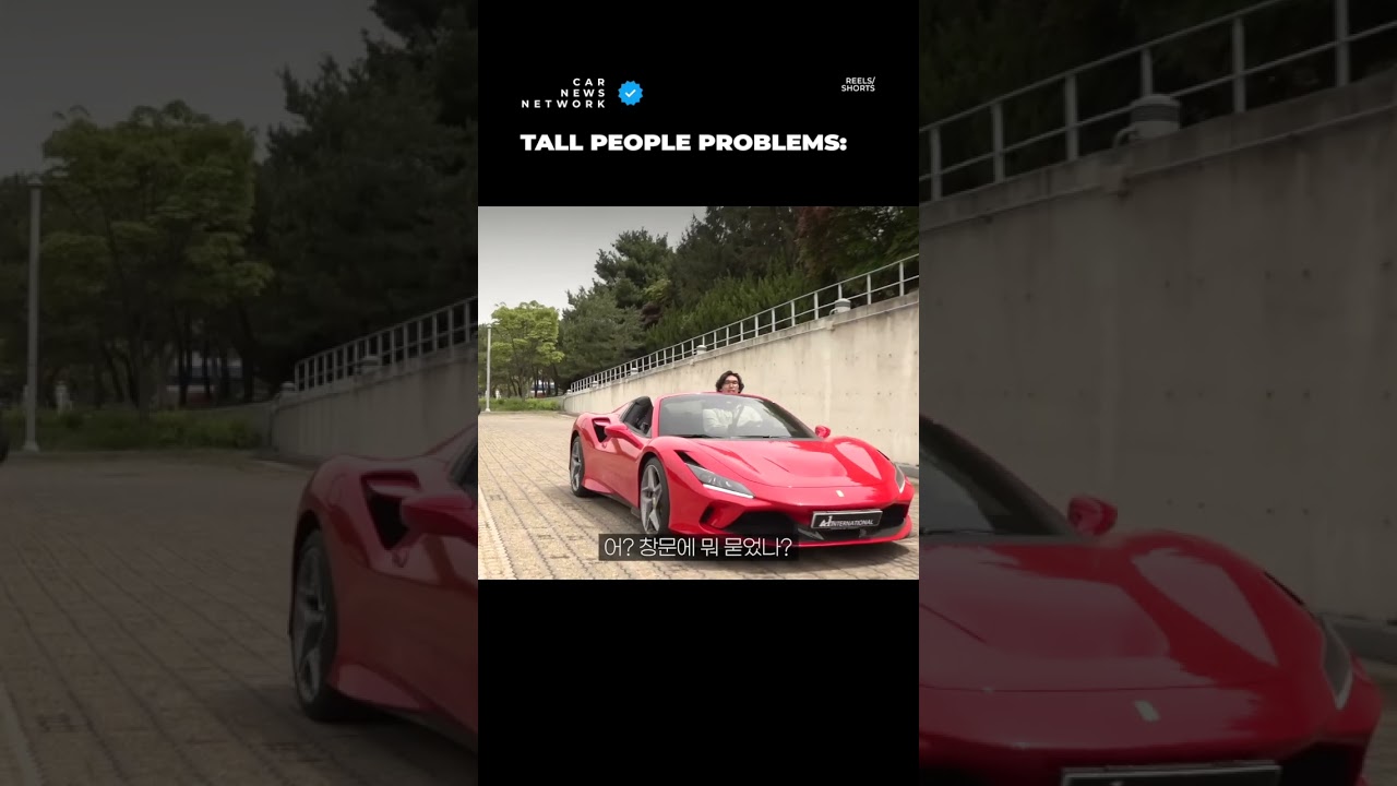 A 7 ft 3 / 221 cm tall guy in a Ferrari 👀