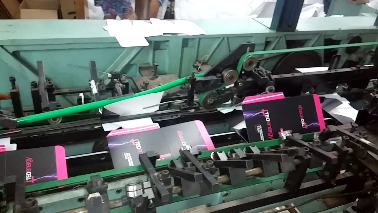 PEGADO DE CAJAS CON TRES PEGAS