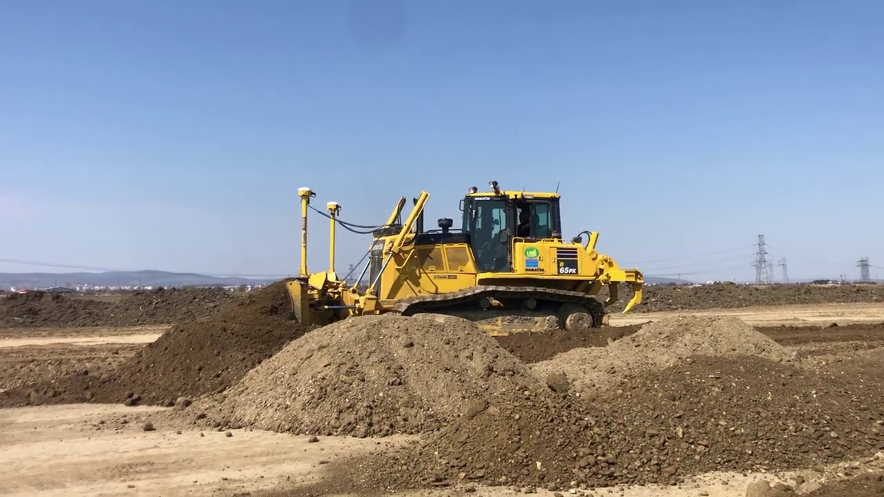 Komatsu D65PX-18 working in a highway application
