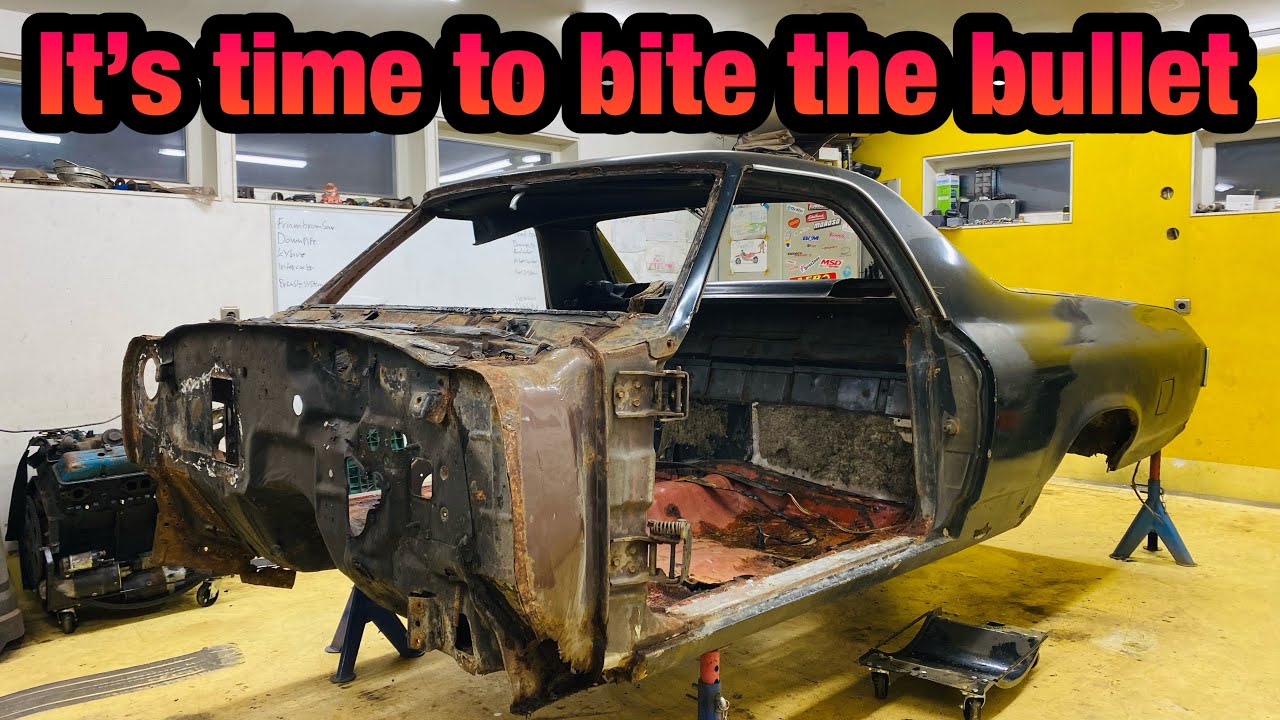 Finally the El Camino gets pushed in to the garage to eliminate all the rust